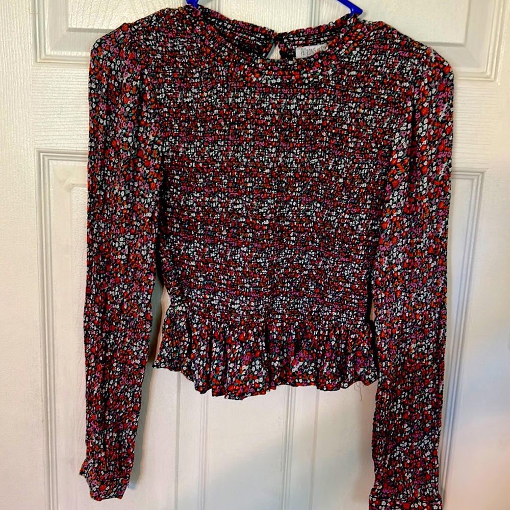 Gently worn Patrons of Peace shirt. Size small